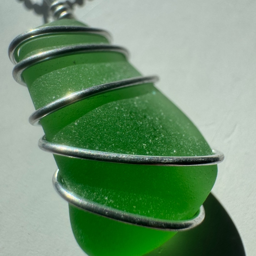 Elegant Green Sea Glass Pendant with Silver Accents